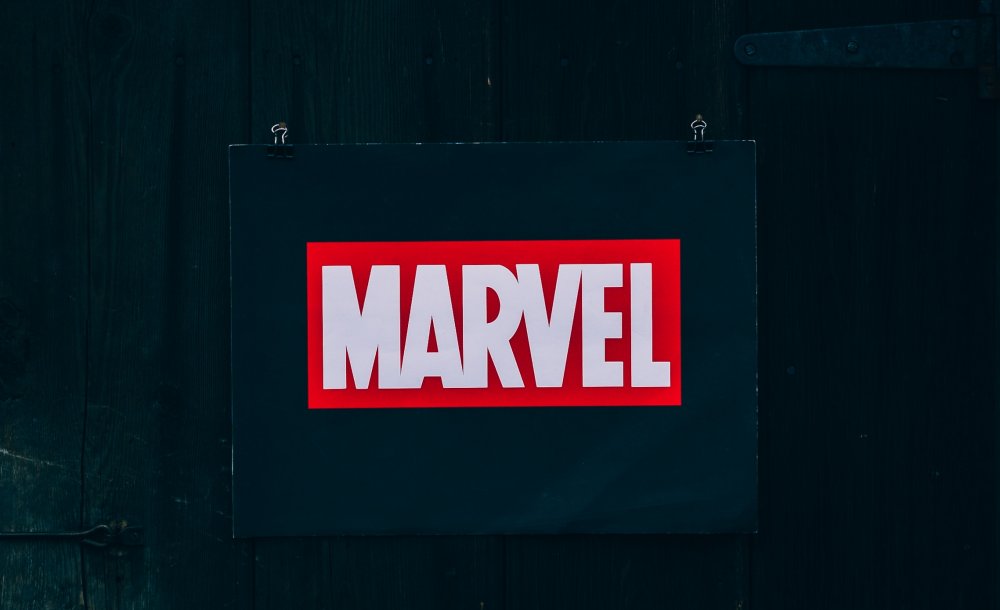 Marvel Comics has a simple recognizable logo that uses the color red to illicit it's emotion.