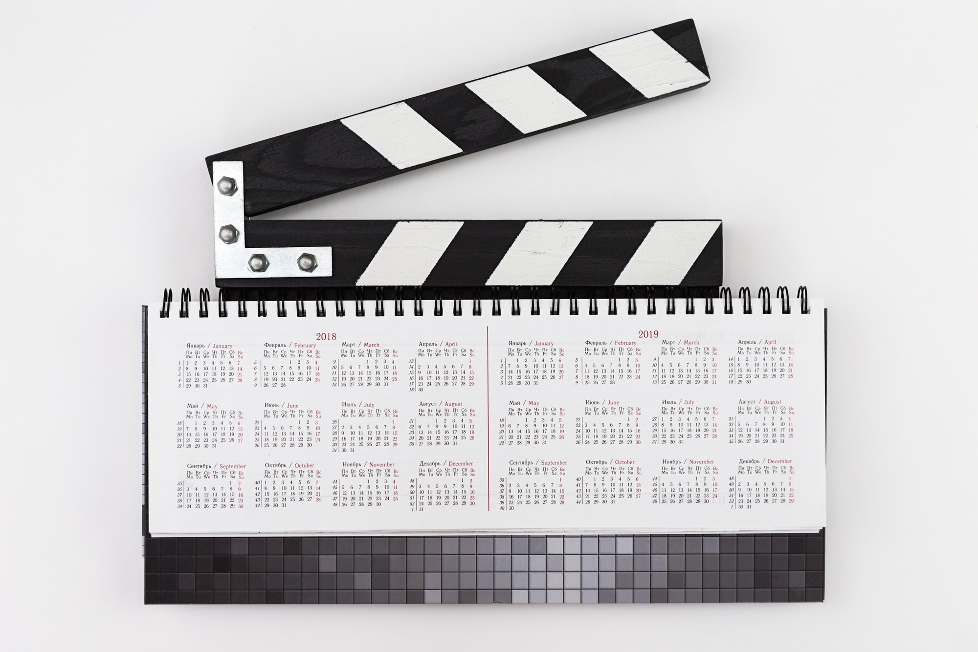 Clapperboard and video calendar.