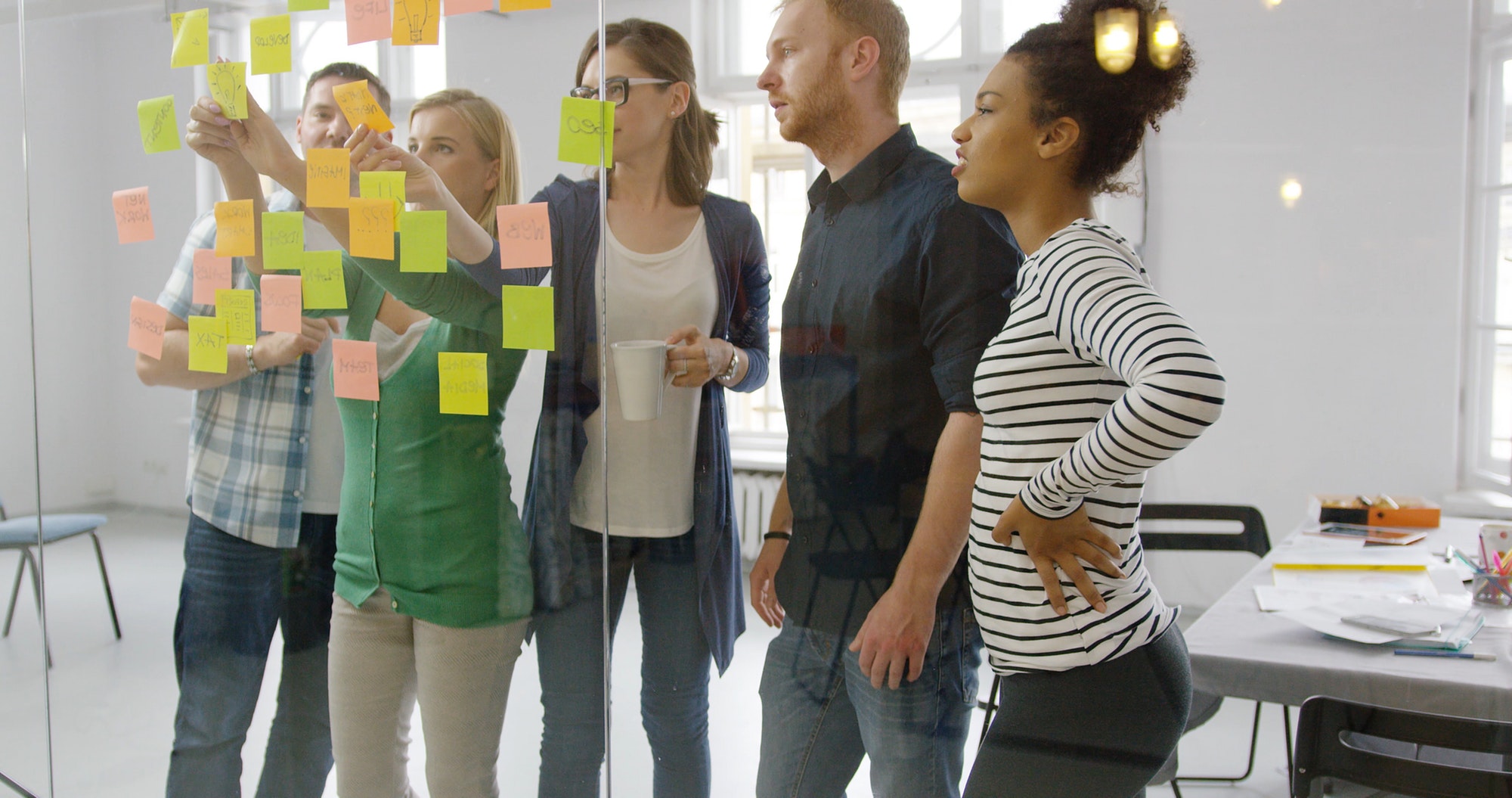 Young people working together in office