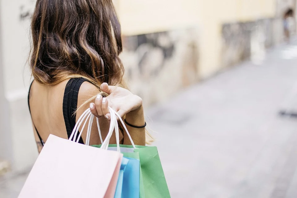 Girl walking after shopping.