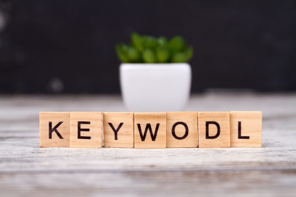 Keywords spelled keywodl with wood blocks.