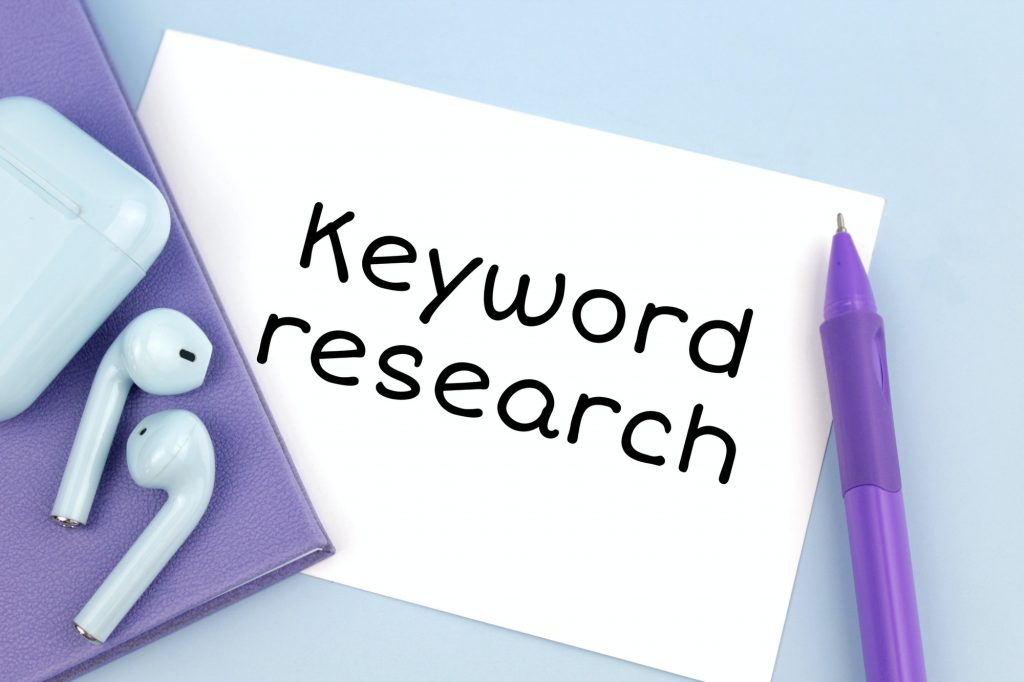 Find The Right Keywords By Doing Keyword Research. Keyword Research Written On Note.