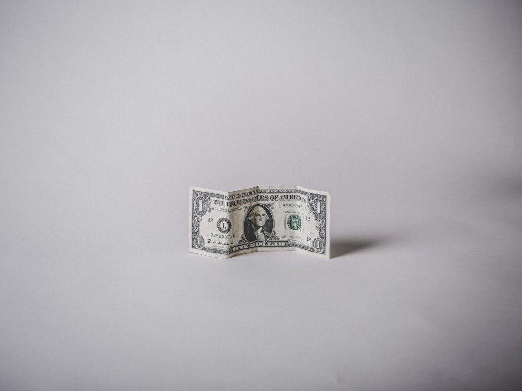 A dollar bill. 8 Top Benefits Of IOS Application Development.