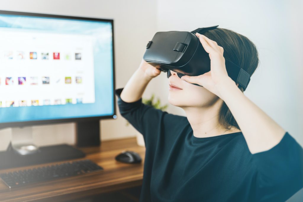 A woman using an augmented reality headset