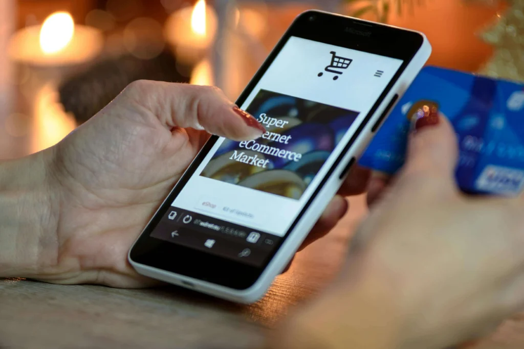 A woman purchasing an item on her phone