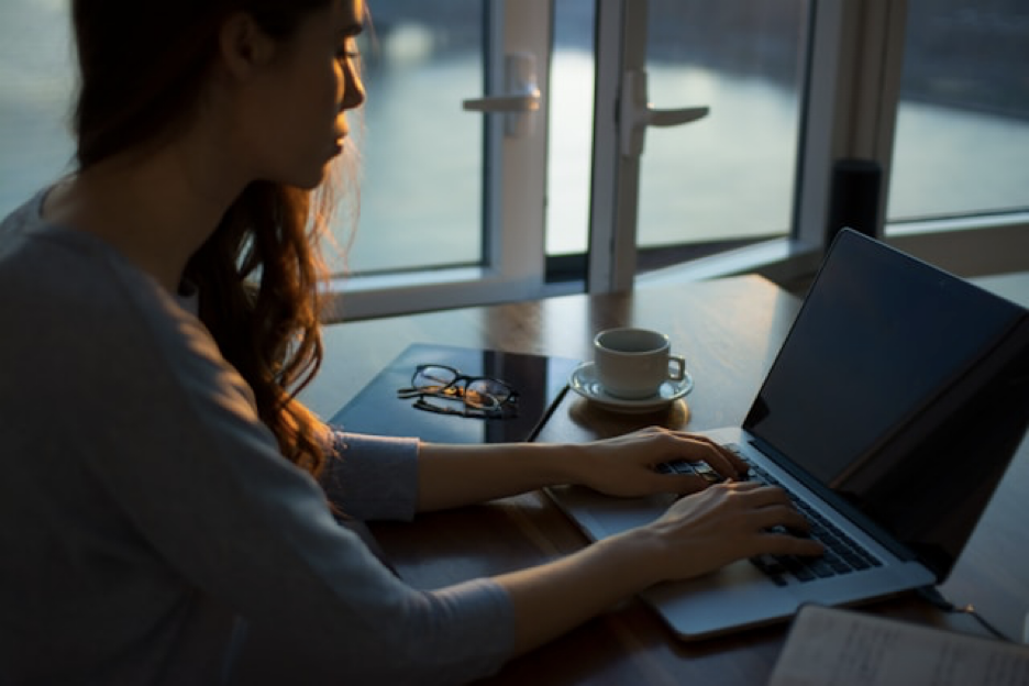 Woman sitting at her computer.